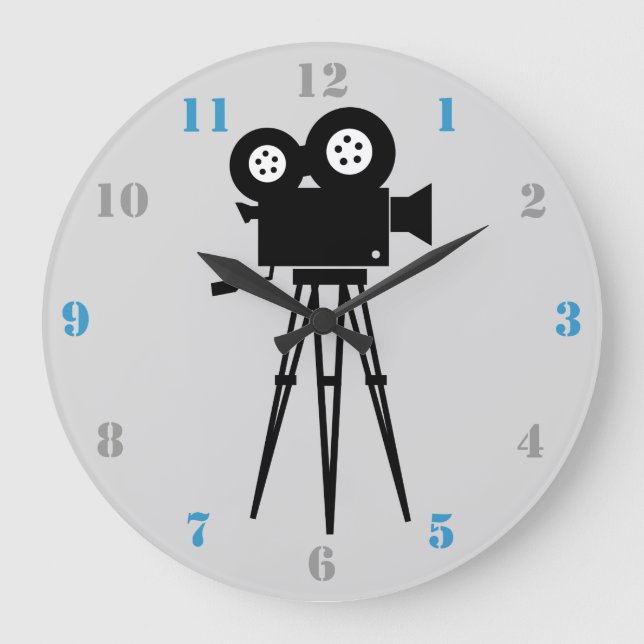 FILKAMERA OCH TRIPOD MED GRÅTT- OCH BLÅNUMMER STOR KLOCKA (Framsida)
