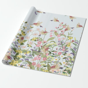 Fin hummingbird i sötad blommigt blomgarde presentpapper
