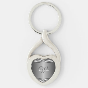 Fin unik geometrisk Silver monogrammad Twisted Heart Silverfärgad Nyckelring