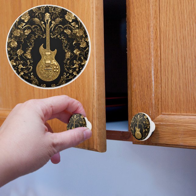Finare Guld Electric Guitar on Black Knopp (Skapare uppladdad)