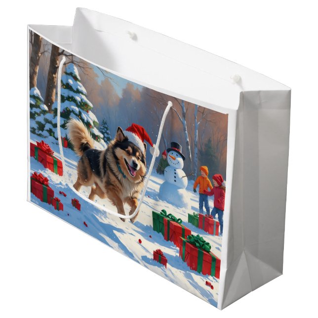 Finsk Lapphund springer i snö med julhatt (Framsidan Vinklad)