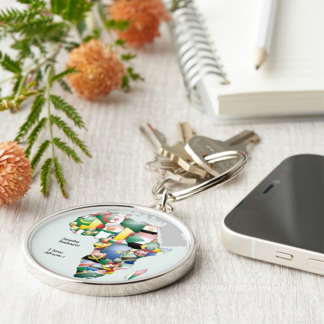 Firande i Afrikan i Flaggor Design Rund Silverfärgad Nyckelring (Sidan)