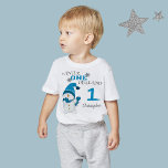 First Birthday Winter Onderland Snowman Boy  T Shirt<br><div class="desc">Winter Onederland 1st first birthday party,  holiday Christmas Winter T-shirt. Cute Little Snowman with blue beanie and scarf. You can personalize this adorable t-shirt with your child's name.</div>