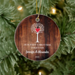 First Christmas together love tree wood photo Julgransprydnad Keramik<br><div class="desc">Our first Christmas together ornament. Rustic dark wood background with white love tree illustration. 
Beautiful ornament to decorate you christmas tree.
You can personalize it and add your own photo at the back,  text,  names and year.</div>