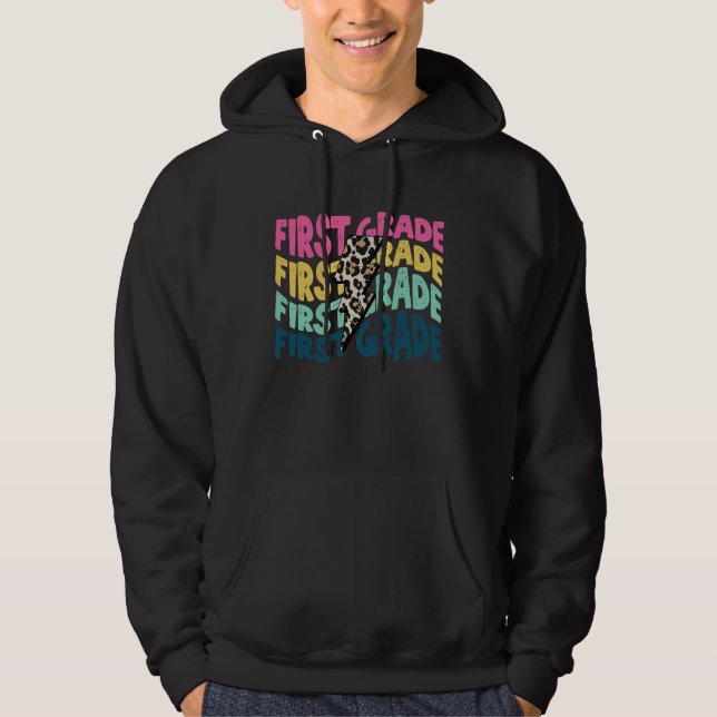 First Grade Leopard Lightning Bolt Teacher Back To Hoodie (Framsida)