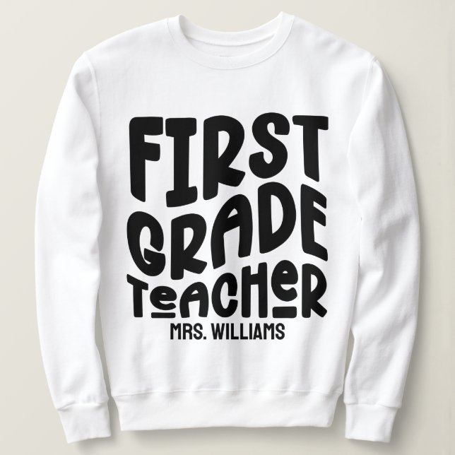 First Grade Teacher Black Typography Design T Shirt (Design framsida)