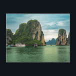 Fishing Village on Ha Long Bay, Vietnam Postcard Vykort<br><div class="desc">Photo of a fishing village amid the spectacular limestone rock formations on Ha Long Bay in Vietnam. Ha Long Bay is a UNESCO World Heritage Site and is known for its stunning emerald green waters as well as its ancient fishing villages and rock formations made of limestone.</div>