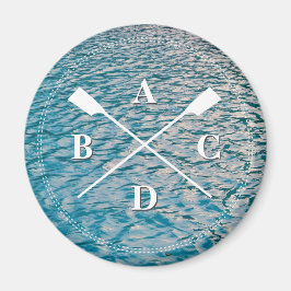 Fiske efter roddkorsning av havre i monogram initi magnet