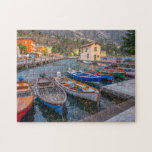 Fiskebåtar vid Sjö i Riva del Garda-Italien Pussel<br><div class="desc">Det här scenpusslet har färgstarka fiskebåtar på sjö vid Riva del Garda i Italien #resa #jigsawpuzzle #stockingstuffers #Games</div>