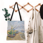 Fiskebåtar | Vincent van Gogh Tygkasse<br><div class="desc">Fiskebåtar vid stranden vid Saintes-Maries (1888) av den nederländske postimponerande konstnären Vincent Van Gogh. Originalteckningar är en olja på sjölandskapet på arbetsytan som målar upp flera fiskebåtar på havets strand. Använda verktygen för att lägga till anpassningsbar eller anpassa bilden.</div>