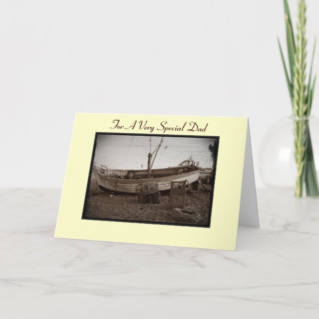 Fiskefartyg med hummertinor på stranden till pappa kort (Framsida)