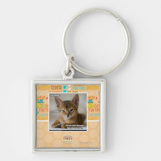 Fjädern är död fyrkantig silverfärgad nyckelring (Framsidan)