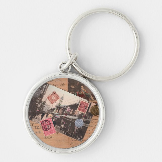 Fjärran östern rund silverfärgad nyckelring (Framsidan)