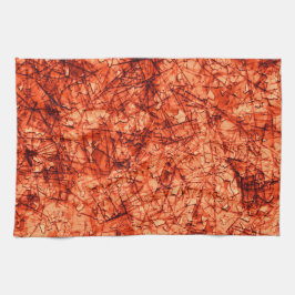 Fläckar på en lätt fläckig korallbakgrund kökshandduk