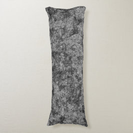 Fläckar på ett lätt fläckat grått till svart kroppskudde