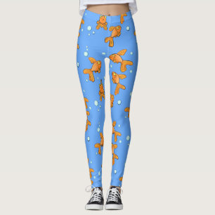 Fläckfisk av orange på blått tecknad leggings