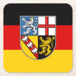 Flagga av Papper Underlägg på Saarlands torg<br><div class="desc">Pappra kustområden med flagga Saarland; utformning med vågrät tricolor of black,  red and gult (golden),  där staten jackar arm i mitten</div>