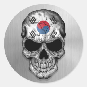Flagga av Sydkorea på en grafisk stålsättaskall Runt Klistermärke