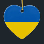 Flagga av Ukraina - ukrainsk flagga - Julgransprydnad Keramik<br><div class="desc">Medborgareflagga av Ukraina - ukrainsk flagga - державнийПрапорУкраїни
banret land,  Europa,  flagga av ukraine,  flagga ukraine,  flaggamedborgare,  ukrainare,  nationalisten,  nationalism som är höger,  right wing,  sjunker</div>