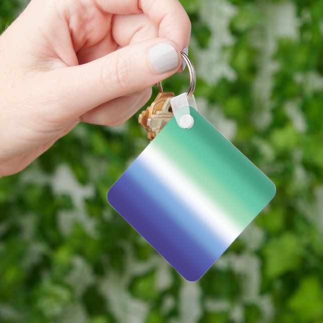 Flagga för övertoningsgay MLM-Pride - färglöst MLM Nyckelring (Hand)