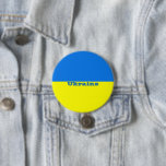 Flagga i Ukraina Knapp<br><div class="desc">Ukraina Flagga,  märkt</div>