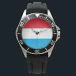 Flagga Luxemburg Armbandsur<br><div class="desc">Detta projekt är utmärkande för Luxemburgs flagga (officiellt Storhertigdömet Luxemburg), som är ett inlandsområde land i Westerna Europa. Belgien gränsar till väster och norr, Tysklant till öster och Frankrike söderut. Luxemburgs huvudstad är Luxemburg City, som är en av EU:s fyra huvudstäder i officiellen (tillsammans med Bryssel, Frankfurt och Strasbourg). Det...</div>