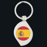 flagga swirl silverfärgad nyckelring<br><div class="desc">Spaniens flagga (spanska: Bandera de España), såsom den definieras i den spanska konstitutionen från 1978, består av tre ränder i vågrät: rött, gult och rött, där gult rand är dubbelt så storlek som varje rött rand. Traditionellt har mitten rand definierats genom gualdas mer arkaiska beteckning, och därmed det populära namn...</div>