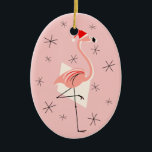 Flamingo Santa Rosa Text ornament oval<br><div class="desc">En livlig,  snabb juldesign med återtryck som har en rosa flamingo med en julhatt,  gräddgeometriska former och stjärnor på en rosa (färg ändring) bakgrund. Ett anpassade som du kan anpassa med egen text,  bilder och egna idéer. En originalbild för digital konst skapat av QuirkyChic.</div>