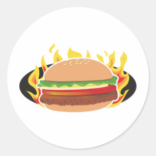 Flammande hamburgare runt klistermärke