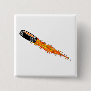 Flammande hockeyPuck Knapp