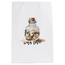 Flaska med stjärnfisk från stranden