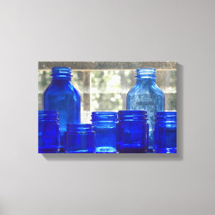 Flaskor av blått antique-glas (Kanvastryck) Canvastryck