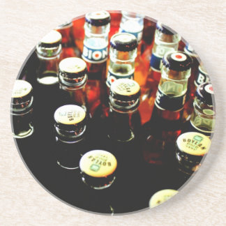 Flaskor, flaskor och mer flaskaunderlägg underlägg sandsten