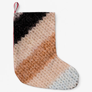 Flerfärgad, stripad ull, struktur-closeup p liten julstrumpa