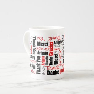 Flerspråkig svart "Tack"-typografi Benporslin Mugg