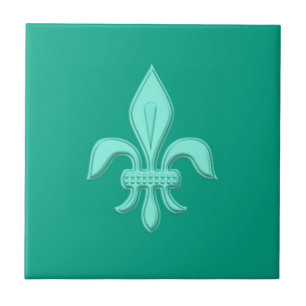 Fleur de Lis i ljus Aqua på turkos Kakelplatta