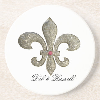 Fleur de lis med beställnings- namn underlägg sandsten