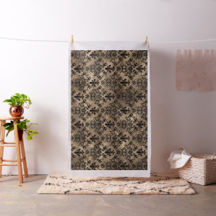 Fleur-de-lis-mönster svart på guld tyg