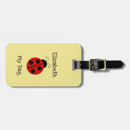 Flicka anpassningsbarnamn med nyckelpiga bagagebricka