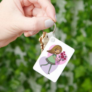 Flicka med blommor nyckelring