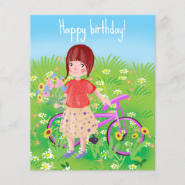 Flicka med cykel på en blommande äng