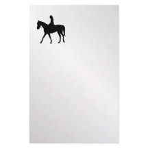 Flicka på häst