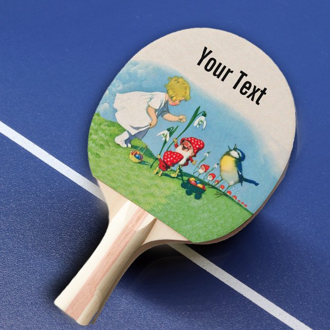 Flicka Påsklilja Tomte Alver Sjungande Fågel Korg Pingisracket (Little girl with cute elves red hats singing bird Easter eggs and lily flowers on ping pong paddle.)