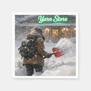 Flicka skottar snö till en garnbutik pappersservett