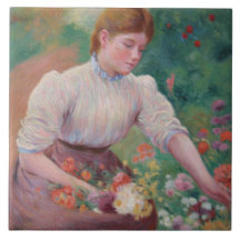 Flicka som plockar blommor i en sommarsalong