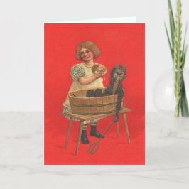 Flicka städar Krampus Helgkort