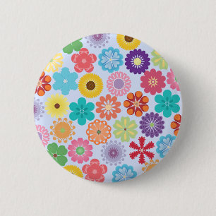 Flickaktigt färgrik blommönster för flower power knapp