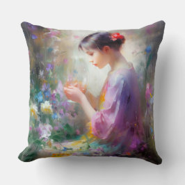 Flickan beundrar en blomma i hennes händer kudde