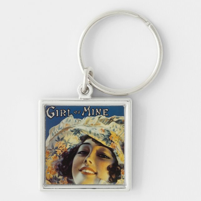 Flickan i Mine Fyrkantig Silverfärgad Nyckelring (Framsidan)
