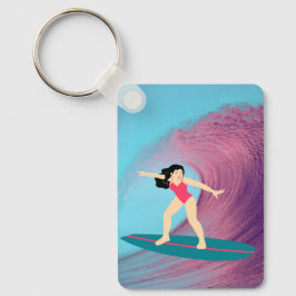 Flickan surfar på solnedgången. nyckelring